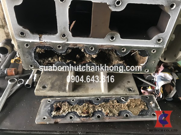 sua chua bom hut chan khong truc vit cho cong ty parker processin viet nam