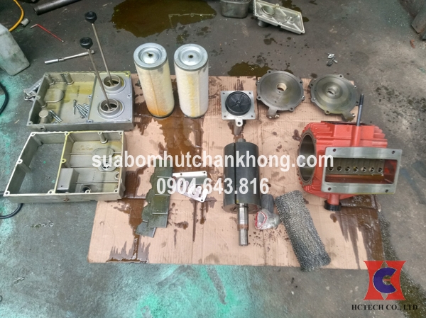Tháo bơm chân không để kiểm tra và sửa chữa